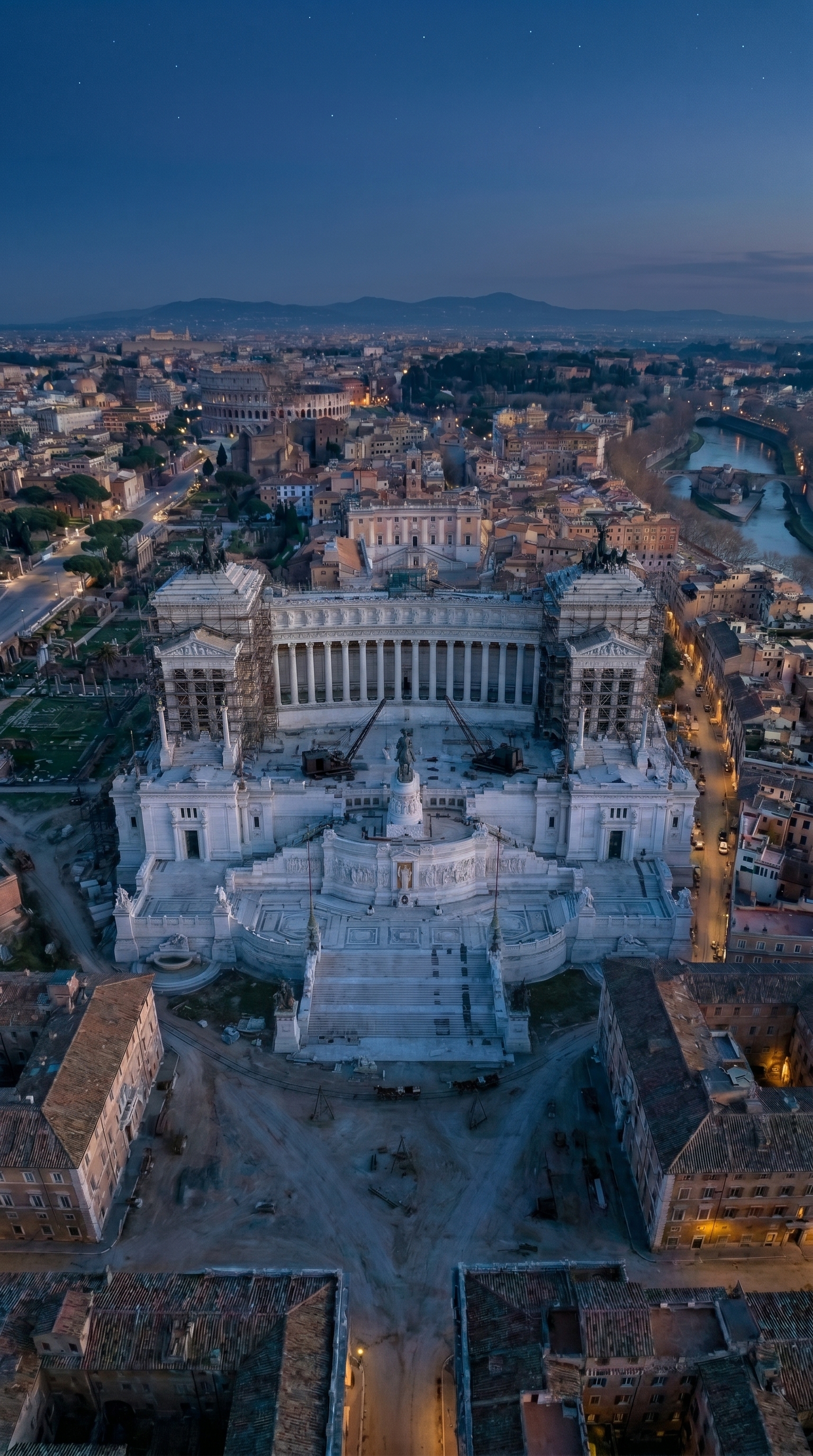 Vittoriano Rome aerial night view with city lights